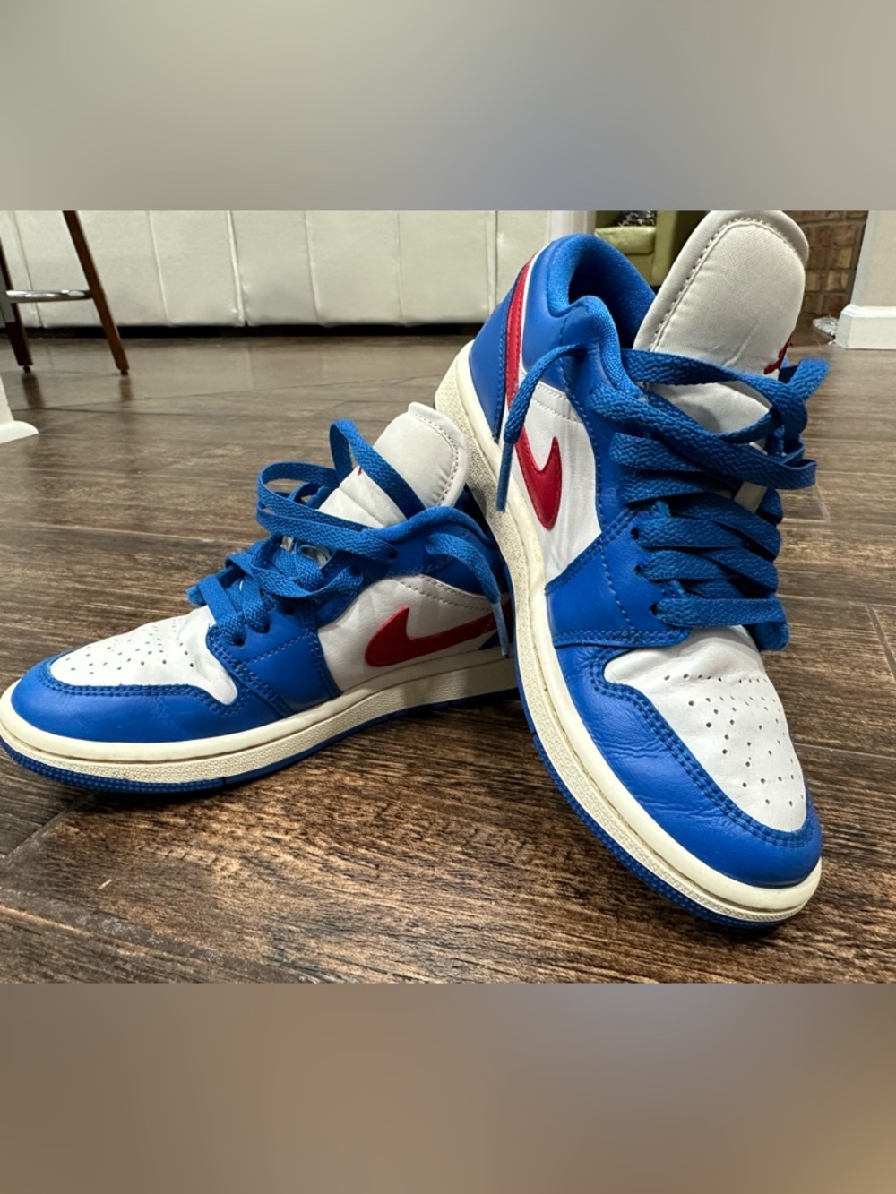 Nike Air Jordan’s Low-Top Sneakers in Blue, White & Red Accents